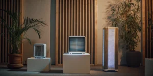 Best HVAC air purifier with UV light, featuring three models in a modern home.